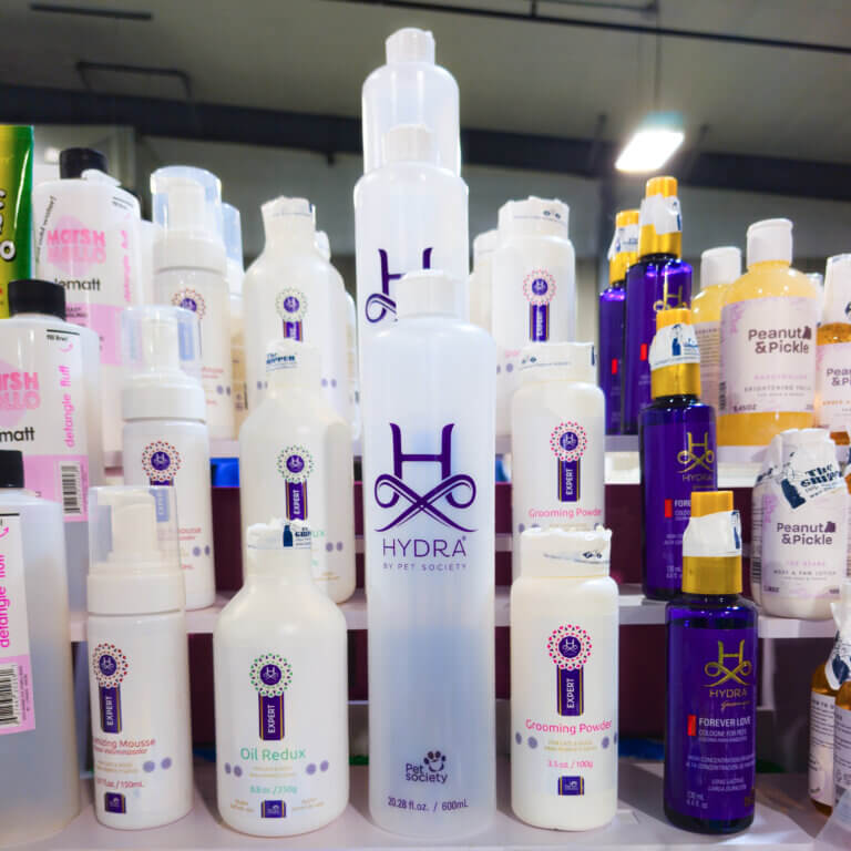 dog grooming supplies at a trade show GroomBox, a subscription box for dog groomers who practice dog grooming.