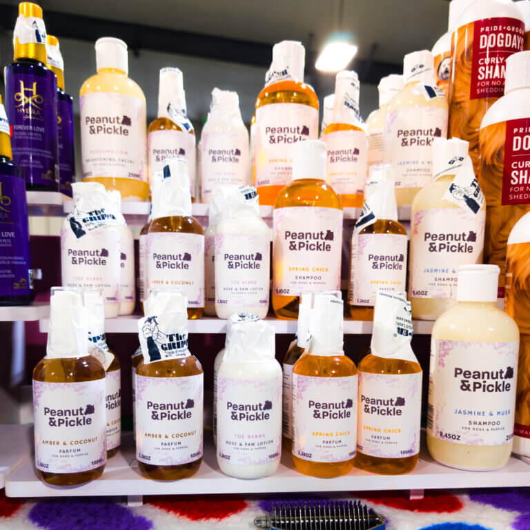 dog grooming supplies at a trade show GroomBox, a subscription box for dog groomers who practice dog grooming.