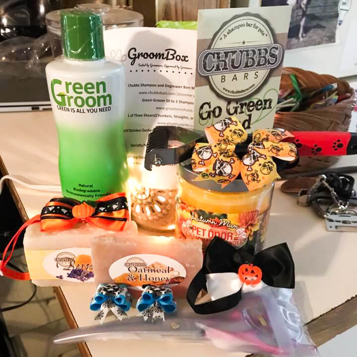 dog grooming supplies through GroomBox, a subscription box for dog groomers who practice dog grooming supplies at a trade show GroomBox, a subscription box for dog groomers who practice dog grooming.