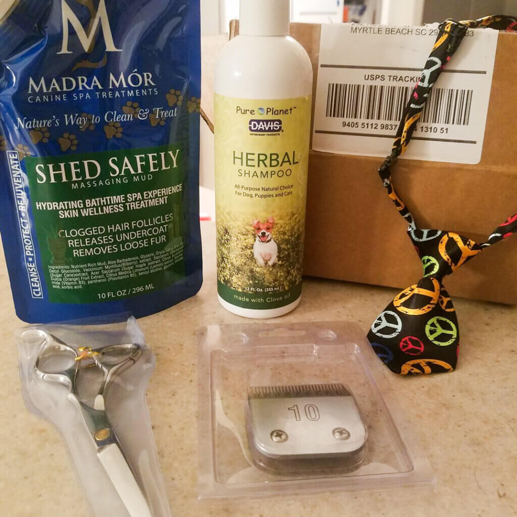 dog grooming supplies through GroomBox, a subscription box for dog groomers who practice dog grooming supplies at a trade show GroomBox, a subscription box for dog groomers who practice dog grooming.