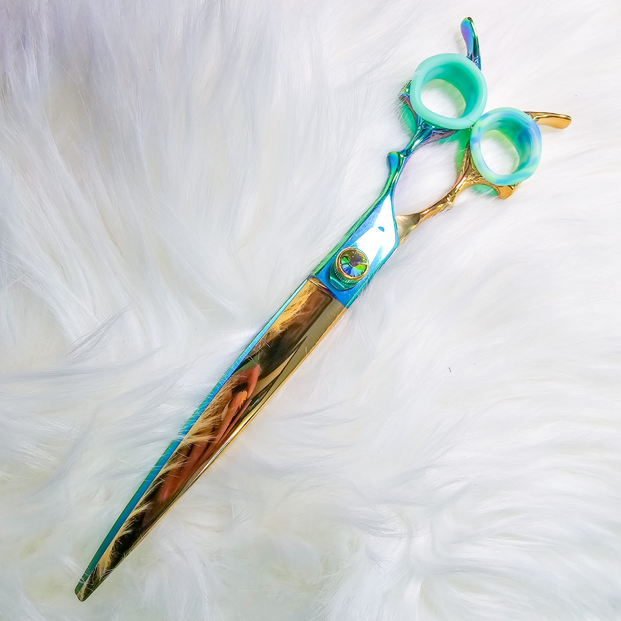 Lucky Curves reversible dog grooming shears with curved blade, four-leaf clover emblem, and ball bearing system by GroomBox.