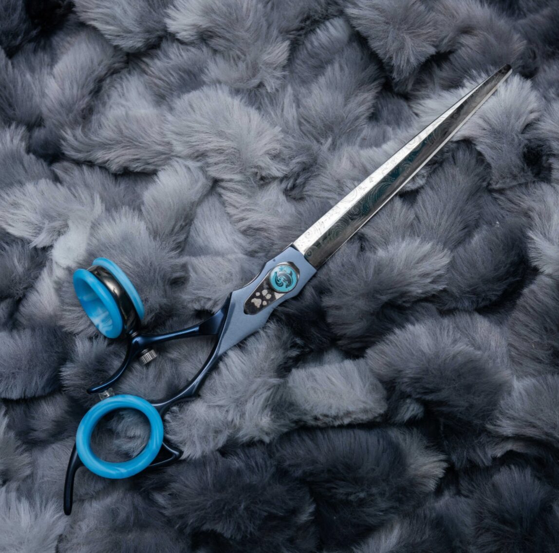 Dolphin Curves swivel dog grooming shears with ergonomic handle, ball bearing system, and curved blade by GroomBox.
